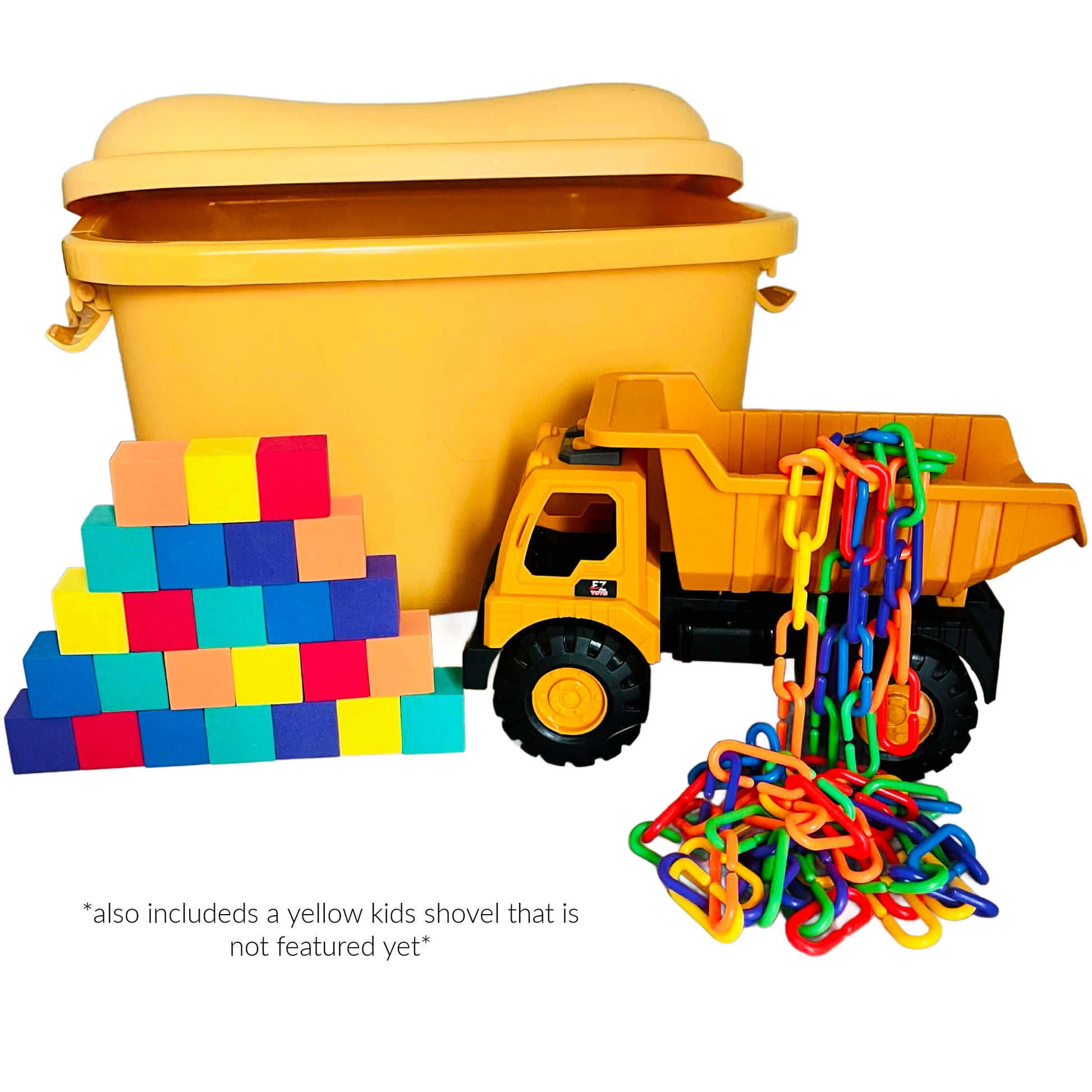 Yellow toy dump truck with colorful chains, building blocks, and a yellow storage bin on a white background.
